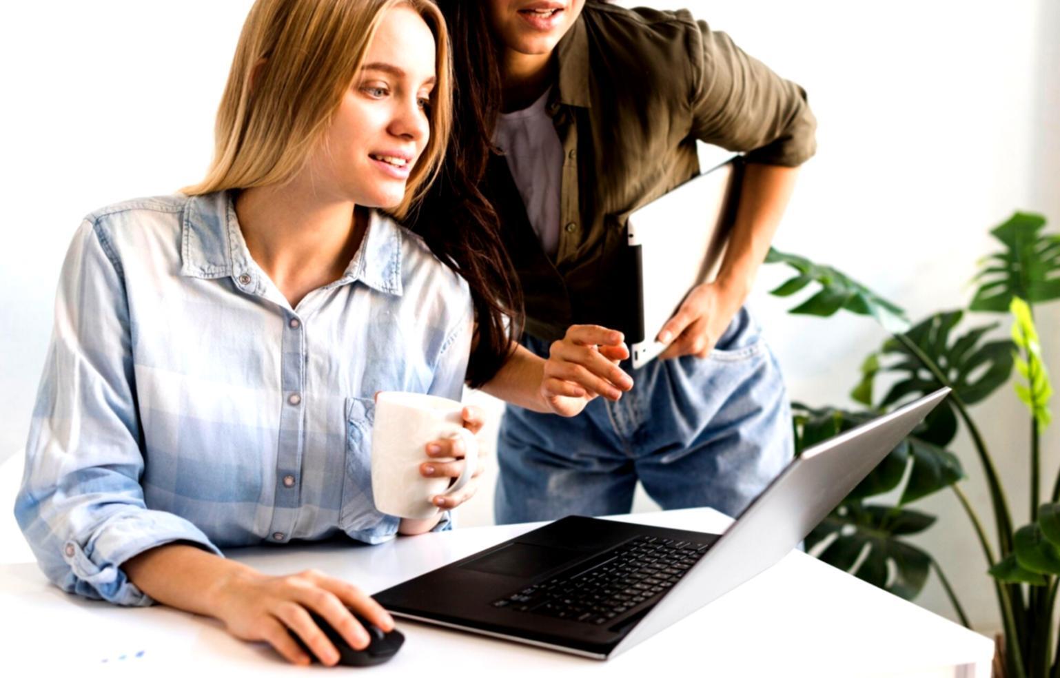 Financial consultation meeting with advisor and client reviewing budget plans and charts